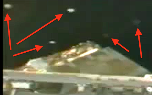 Fleet of UFO's fly by Space Station