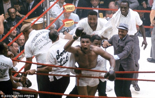 Celebration: When Liston quit after the seventh round Clay started jumping and waving his hands, yelling 'I'm the champ'