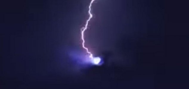 Lightning strikes UFO in New Year's Eve video